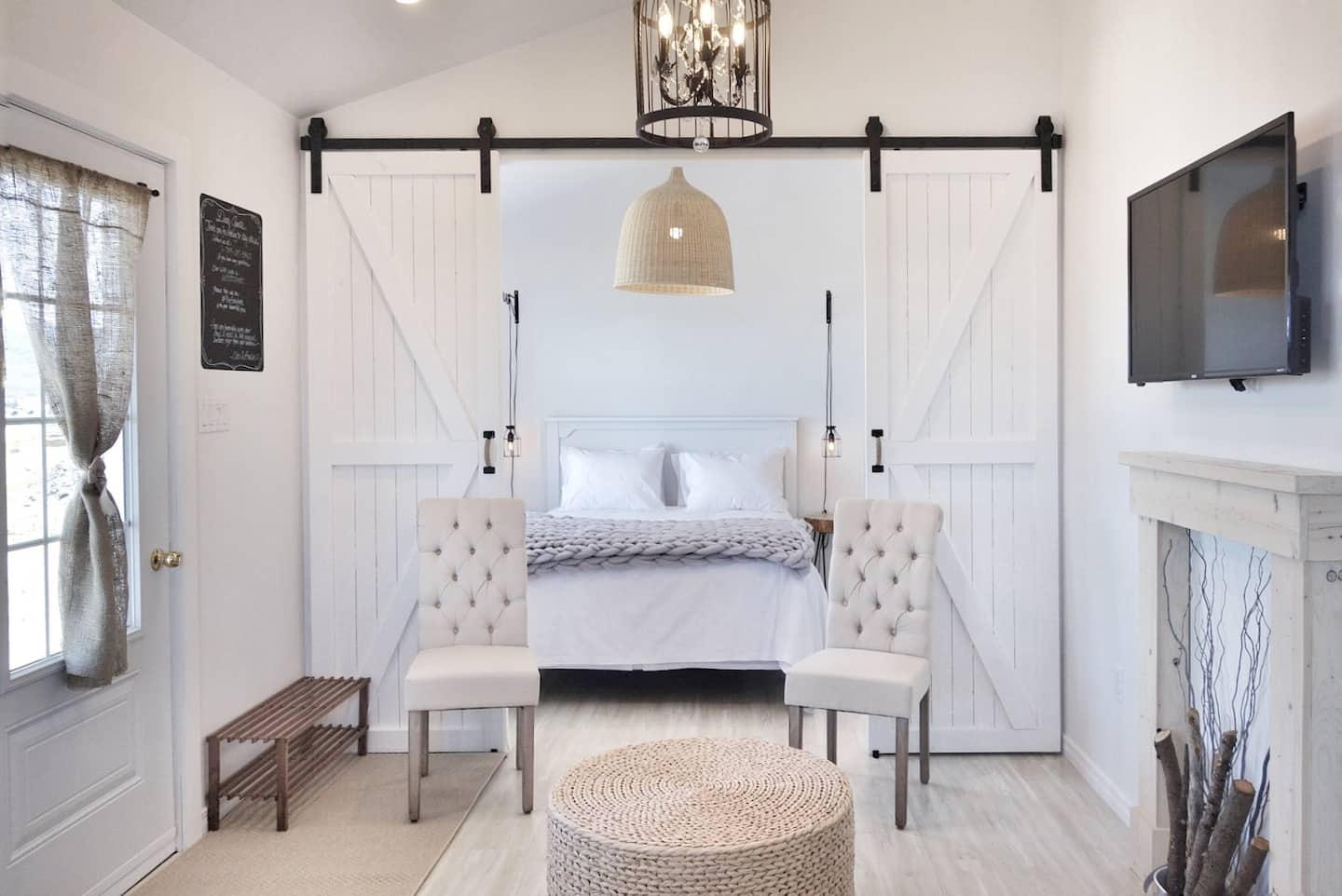 Shabby chic white bedroom in a cottage
