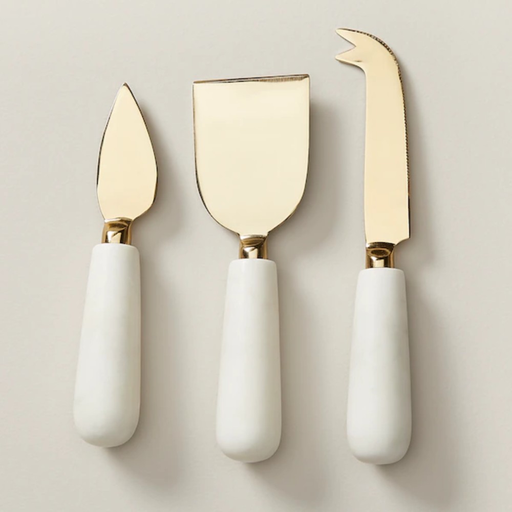 Marble and brass cheese knives