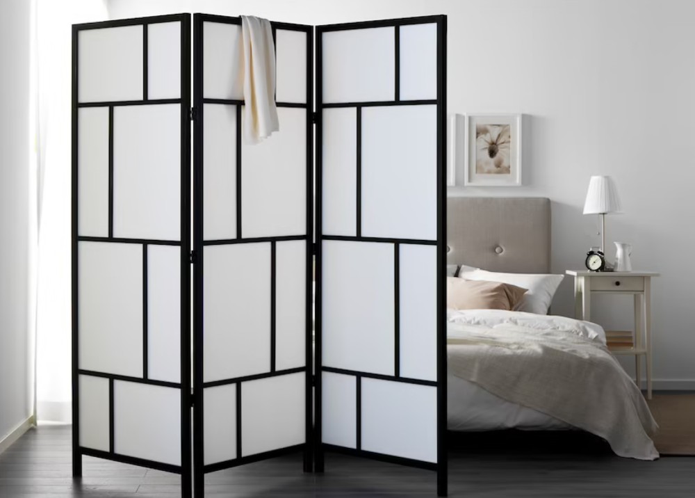 Folding screen with square panels to allow light through