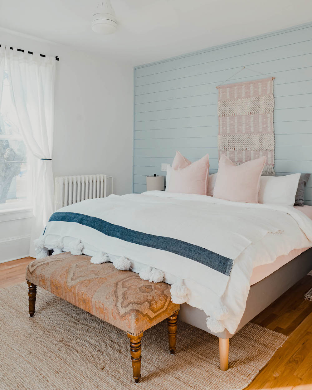 Ivy House Inn tour pastel bedroom with shiplap walls