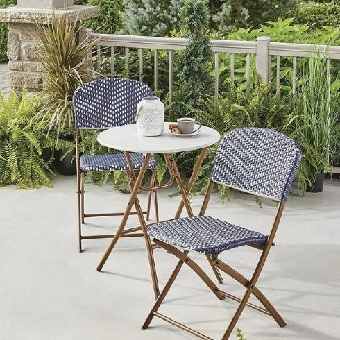 A small blue and white patio set