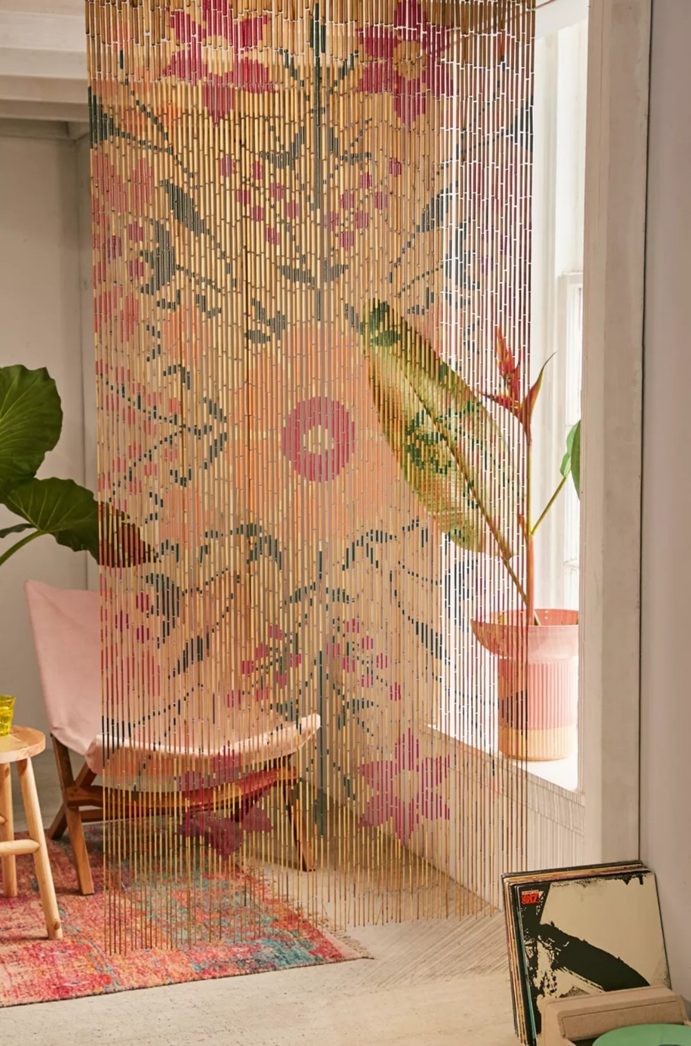 A beaded curtain with floral design