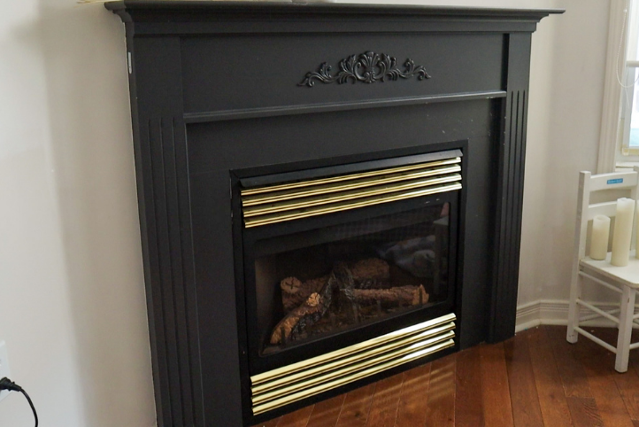 The original builder-grade fireplace.