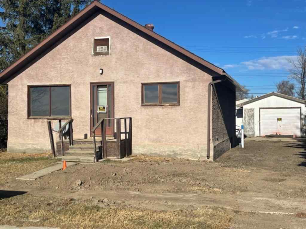 Old brown house in Alberta for sale