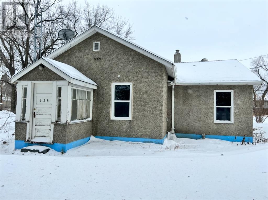Old run down house in snowy Saskatchewan
