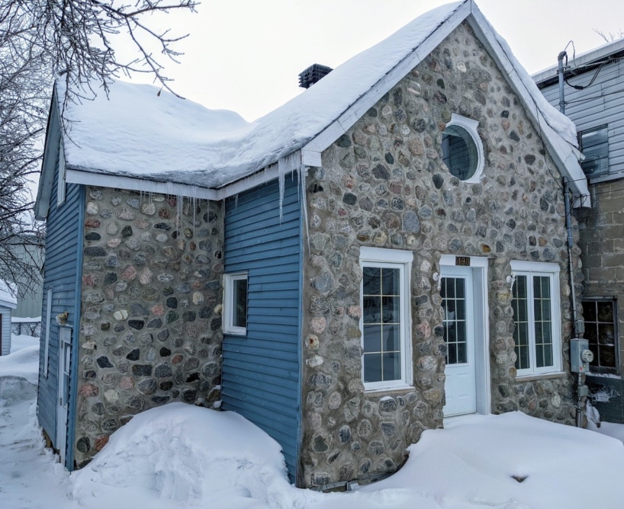 Old stone house in snowy Quebec for sale