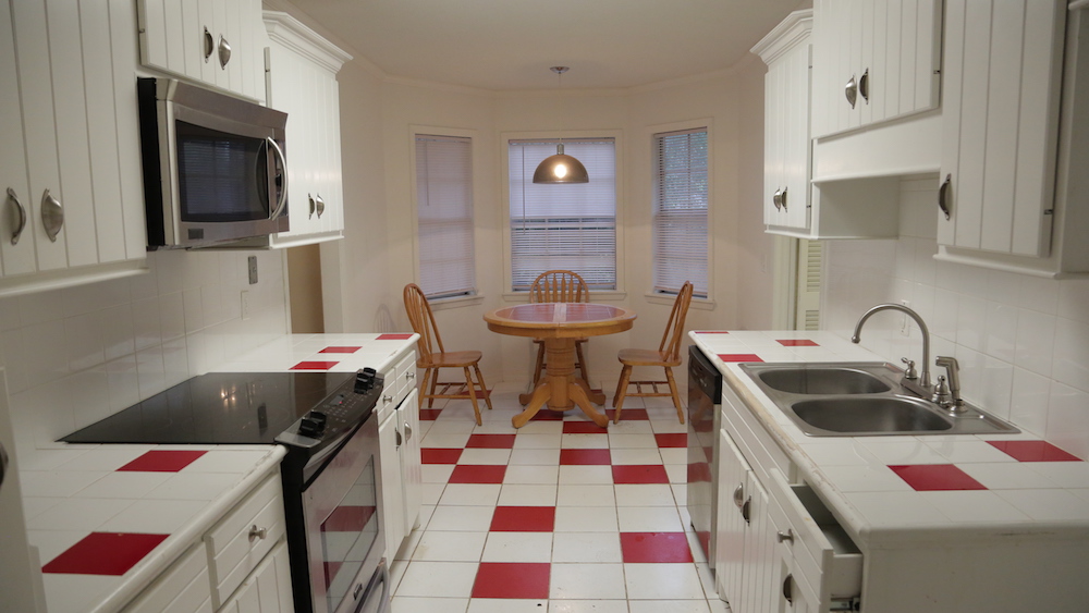 Retro kitchen with red and white floor tiles