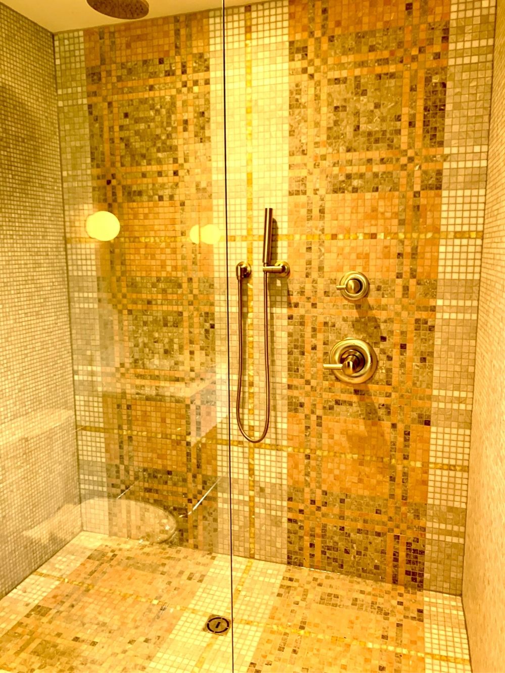 pink mosaic and gold shower