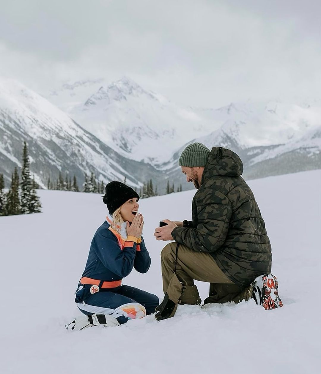 Kortney Wilson and her fiance Ryan proposing in snowy Whistler