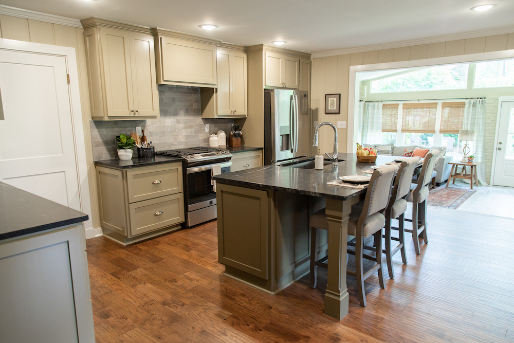 New open-concept kitchen with brown cabinetry