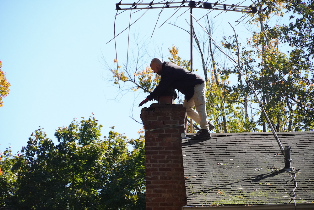 Inspecting the chimney and roof