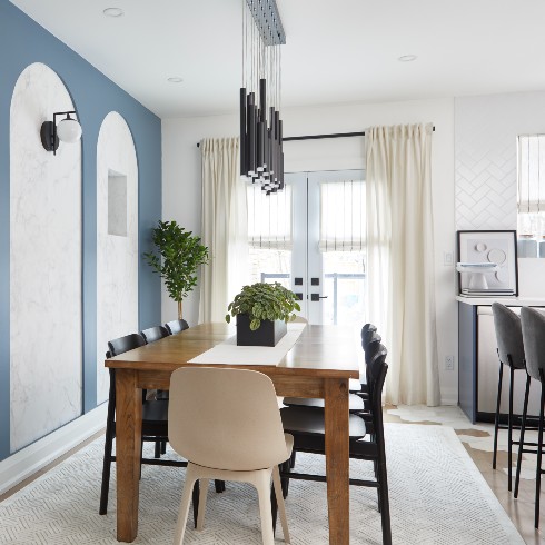 Dining room with blue archway walls