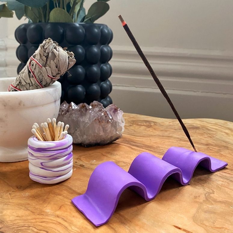 Wavy DIY clay incense holder, clay match holder and white bowl with sage