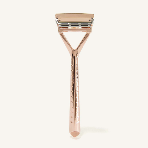 A rose gold zero-waste razor from Leaf Shave.