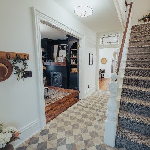 Chester entryway with checkerboard tile floor