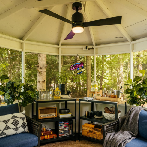 Vacation house gazebo interior with seating area and bar neon lights