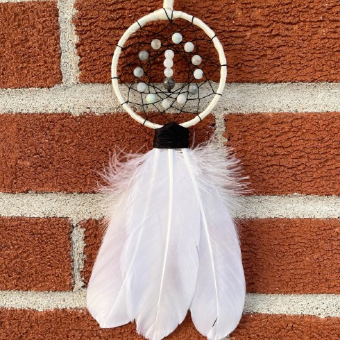 Dream catcher with crystals and feathers
