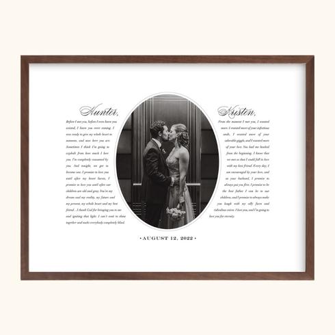 A framed wedding photo with written vows beside it.