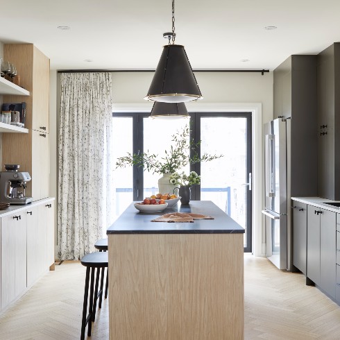 Chic kitchen with wood and grey cabinetry