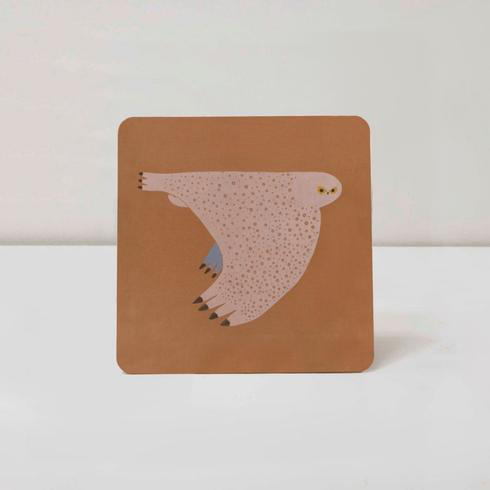 Terracotta placemat with an owl