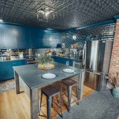 Duplex apartment teal blue kitchen