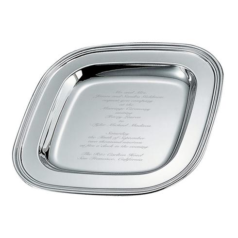 A silver tray with wedding invitation details engraved.
