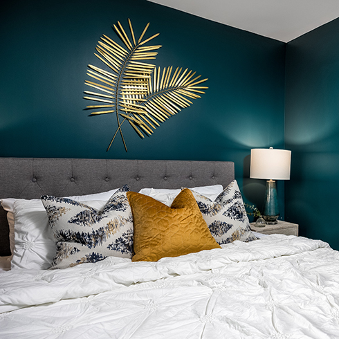bed with decorative wall art