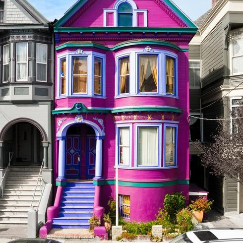 Pink and purple painted house exterior in San Diego