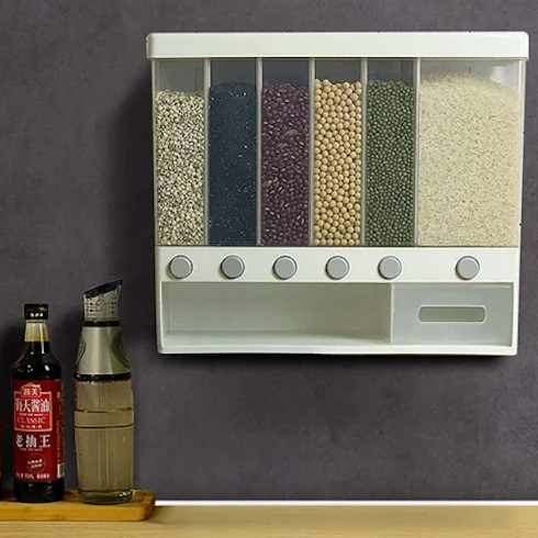 Wall-mounted food dispenser in a kitchen