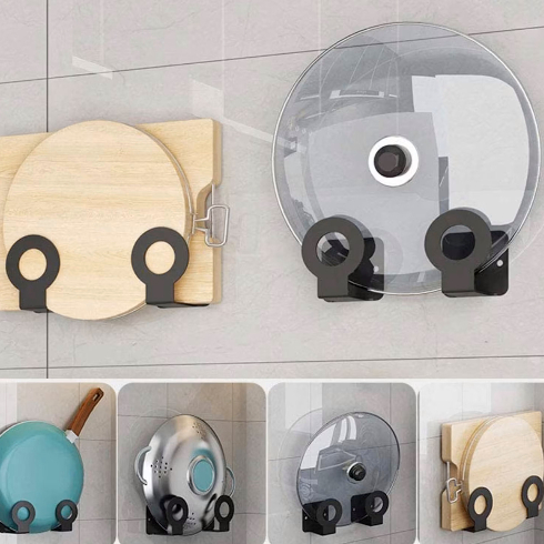 Wall-mounted storage hooks for hanging cookware lids in a kitchen