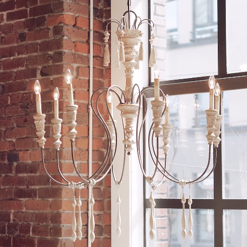 Elegant chandelier with hand carved accents