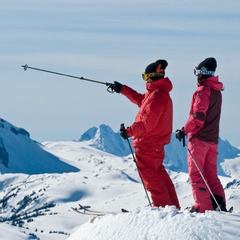 Skiers on a mountain in Whistler