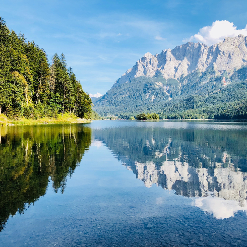 A beautiful landscape shot of mountains and a body of water in Bavaria