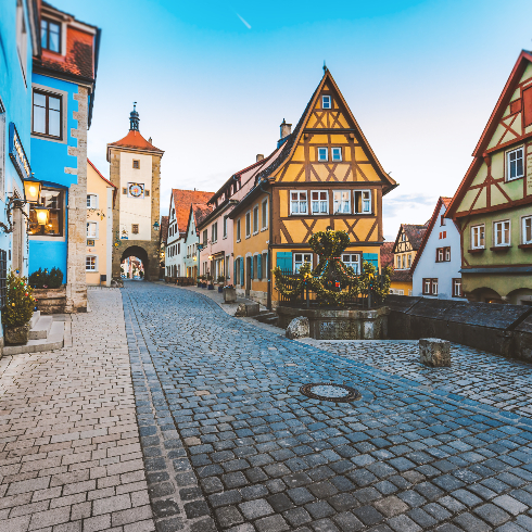 The colourfully painted exteriors of wooden Bavarian buildings