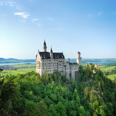 A shot of the mountains and the Bavarian castle, Neuschwanstein