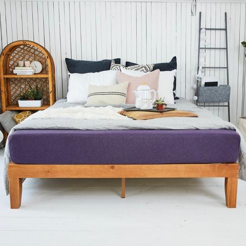 A bedroom with purple Polysleep mattress