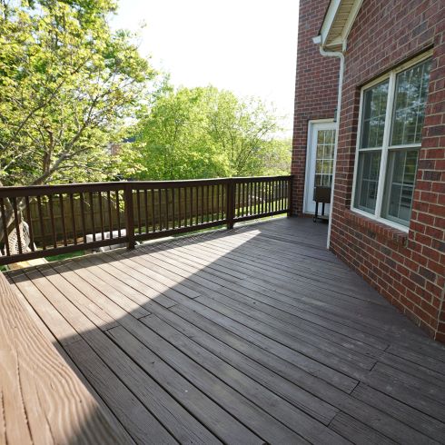 Drab deck at the back of a house