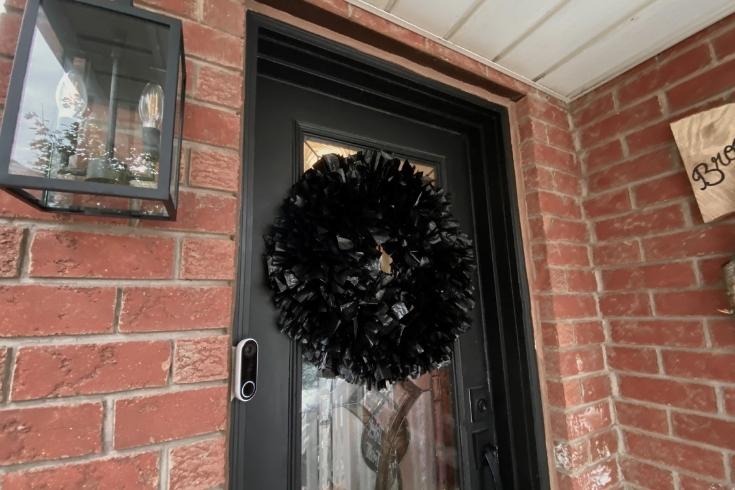 Gothic wreath on a black door 