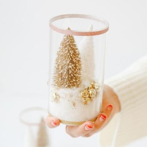 Christmas craft: a vase filled with fake snow and a mini tree