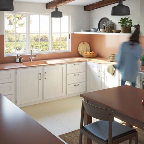 Kitchen with salmon-pink countertops