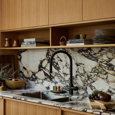 Dynamic marble backsplash in kitchen
