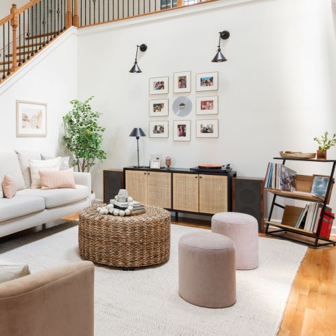Open living space with family photos on the wall