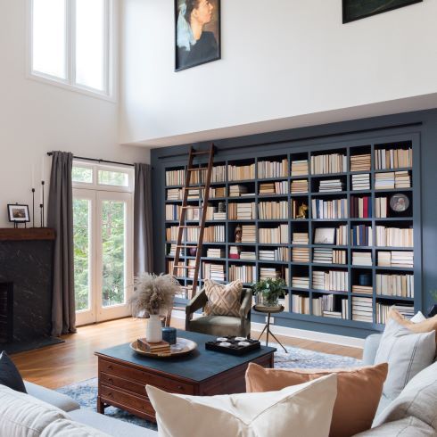 Open living room with large bookshelf