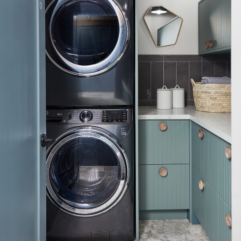 Small-space laundry room with stacked washer and dryer