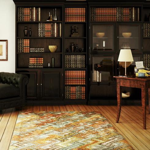 A dark home study with a black bookcase and dark wood furniture