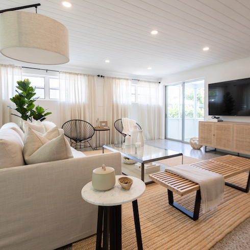 The Baeumler's new rental property monochromatic living room