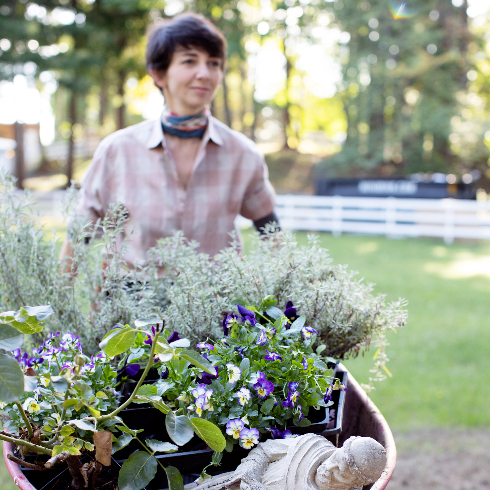 Designer Francesca wheels in flowers to plant in the garden