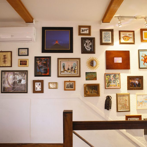 Gallery wall with vintage frames and art