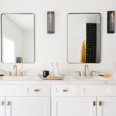 Bathroom with double vanity and rectangle mirrors