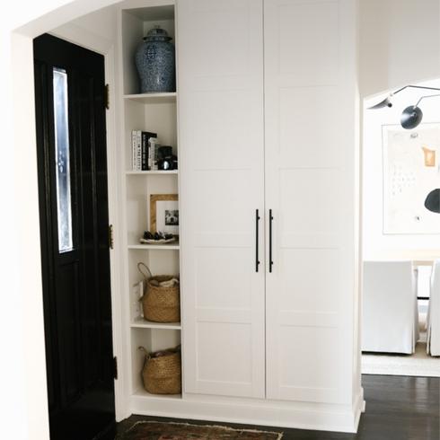 IKEA closet in modern front entryway